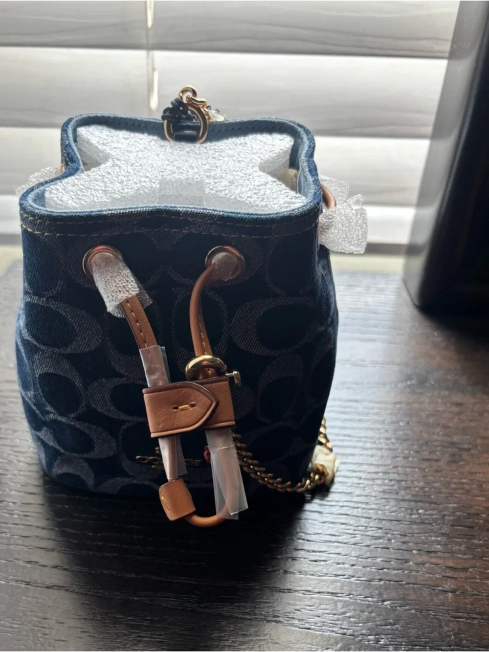 Coach Signature Denim Drawstring Wristlet
Navy Mini Bucket Bag with Gold Chain - Picture 8 of 10